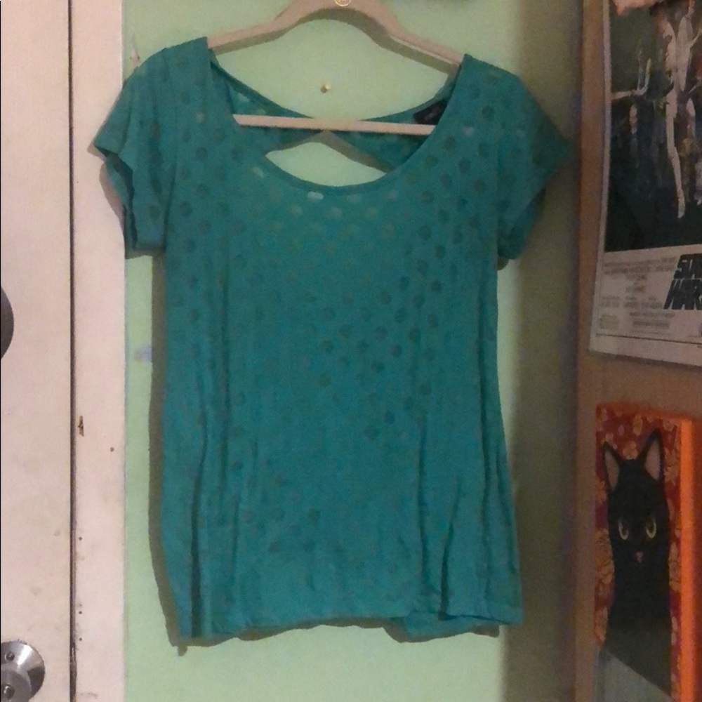 Green back cuttout on shirt w/ circle design/see